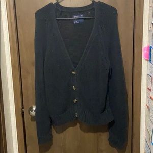 Black knitted sweater.